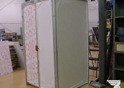 Battery Enclosure shown with protective shipping cover (actual doors & walls are clear)
